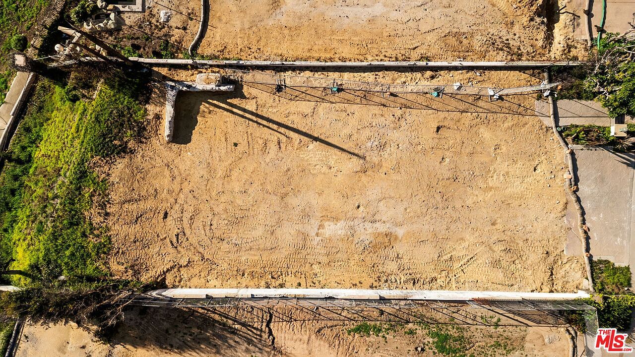 Aerial view of the cleared lot ready for development